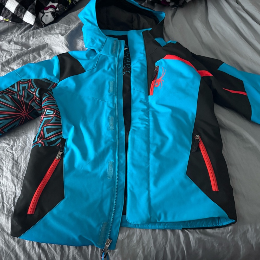 Spyder Kids Vibrant Blue and Black Puffer Jacket with Red Highlights